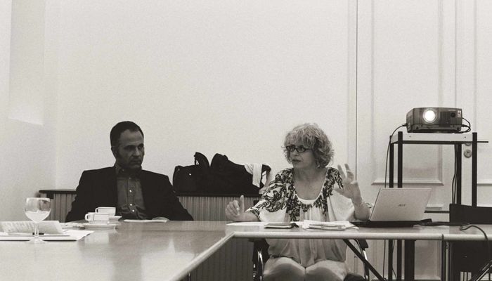 Two people presenting.