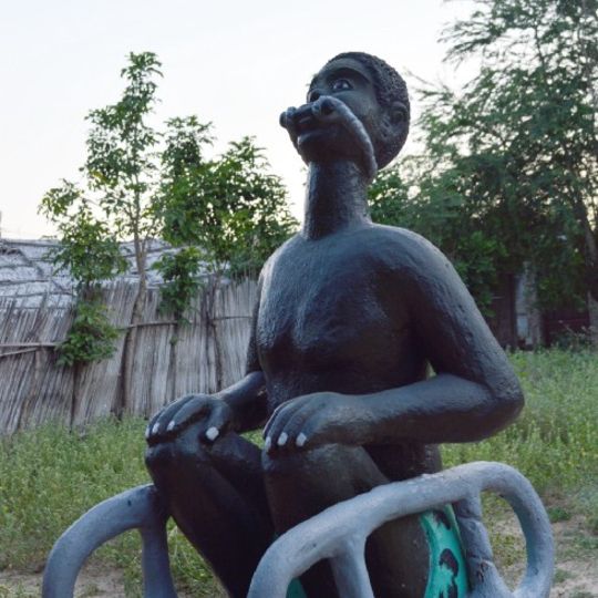 Cyprien Tokoudagba, sculpture of a bound slave ready to ship abroad, Slave Route, Ouidah (photo by Atreyee Gupta)