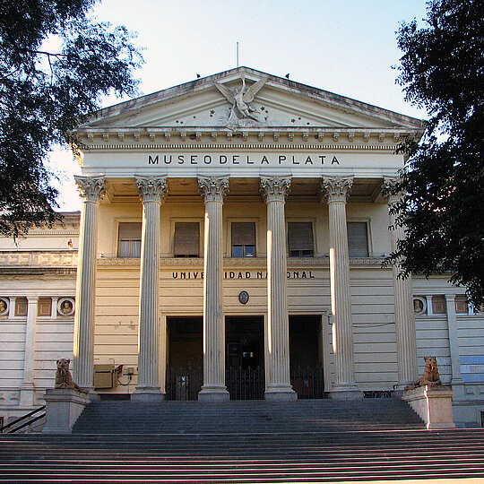 Neoclassical museum building with tall columns and steps leading to the entrance