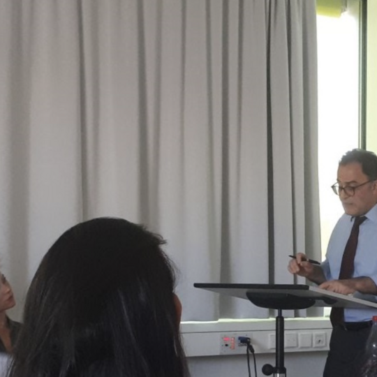 A speaker giving a keynote.
